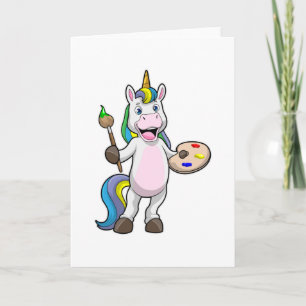 Einhorn beim Malen mit Pinsel und Farbe Karte
