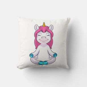 Einhorn beim Meditieren im Sitzen Kissen