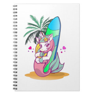Einhorn mit Surfbrett am Strand Notizblock