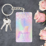 Einhornrosa lila Name holografisch Schlüsselanhänger<br><div class="desc">Ein angesagter holografischer Hintergrund mit Einhorn- und Pastellfarben in Rosa,  lila,  Minzgrün. Dekoriert mit Imitat Glitzer. Personalisieren Sie Ihren Namen und fügen Sie ihn hinzu. Lila Buchstaben. Ein bisschen Alltagsglanz,  um den Tag angenehm zu gestalten!</div>