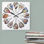Einmal im Alter von 12 Herz geformte Fotos weiß Quadratische Wanduhr<br><div class="desc">Erstellen Sie Ihre eigene Multi-Foto-Uhr, um Ihre Geschichte zu erzählen - die Mitte der Uhr wird mit "Once upon a time" in handgeschriebener Typografie geschrieben. Verwenden Sie die Bildvorlage, um 12 Ihrer bevorzugten Fotos hinzuzufügen, die in herzförmigen Rahmen angezeigt werden. Das Design verwendet porträtierte vertikale Fotos für alle Zahlen außer...</div>