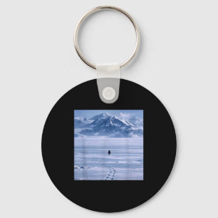 Einzelner Pinguin geht auf einen Berg zu Grafik Ku Schlüsselanhänger