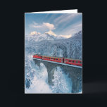 Eis und Schnee | Red Bernina Express Zug Schweiz Karte<br><div class="desc">Dieses phantastische Getty Images Foto besticht durch den Roten Bernina-Express-Zug, der im schneebedeckten Winterwald, Tarasp, Graubünden, Engadin, Schweiz, auf einem Viadukt unterwegs ist.</div>