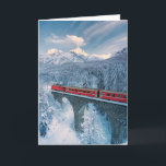 Eis und Schnee | Red Bernina Express Zug Schweiz Karte<br><div class="desc">Dieses phantastische Getty Images Foto besticht durch den Roten Bernina-Express-Zug,  der im schneebedeckten Winterwald,  Tarasp,  Graubünden,  Engadin,  Schweiz,  auf einem Viadukt unterwegs ist.</div>