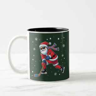 Eishockey-Weihnachtsmann spielt Eissportmannschaft Zweifarbige Tasse