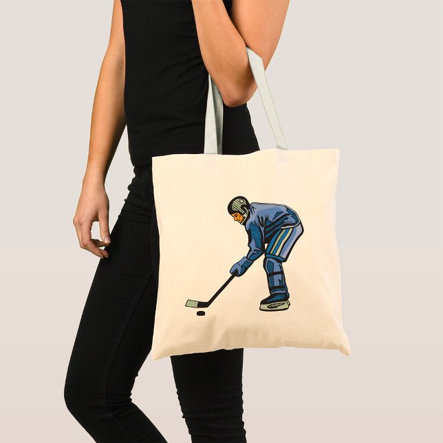 Eishockeyspieler in blauer Uniform Tragetasche (Von Creator hochgeladen)