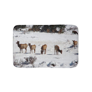 Élan dans tapis de bain neigeux