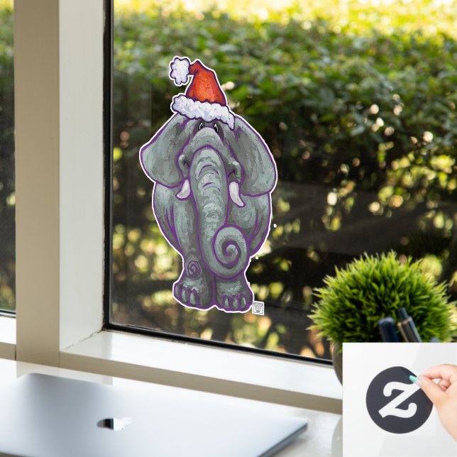Elefant in einer Weihnachtsmannmütze Weihnachtsfen Fensteraufkleber (Büro)
