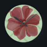 Elegant Burgundy Floral & Sage Green Lattice Patte Runde Wanduhr<br><div class="desc">Add timeless, vintage charm to your life with this elegant floral lattice pattern. The design showcases beautifully shaded, painterly burgundy flowers set against a crisp, sage green diamond trellis background. Blending organic botanical art with clean geometric lines, this pattern is a perfect fit for Grandmillennial, Cottagecore, and home decor. It...</div>
