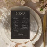Elegant Charcoal Gold Boho Minimalist Wedding Menu<br><div class="desc">Turn your reception table into a formal masterpiece with this striking Elegant Charcoal Gold Foil Wedding Menu. The bold, deep Charcoal background instantly establishes it as a dramatic centerpiece, beautifully contrasting with the Ivory text or simulating a Gold Foil finish for an undisputed touch of luxury. The generous 5.5" x...</div>