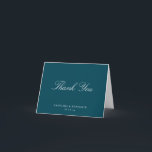 Elegant Classic Script Wedding Teal Blue Folded Dankeskarte<br><div class="desc">This personalized thank you card features a teal background paired with soft white script for a timeless, elegant look. The classic typography feels refined yet approachable, making it a thoughtful way to express gratitude after a wedding, shower, or special celebration. Customize the names and date to reflect your event and...</div>