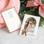 Elegant Coquette Bow Merry Christmas Arch Photo Feiertagspostkarte<br><div class="desc">This charming holiday greeting features an elegant arch shaped photo template with thin pink border, sweet watercolor blush pink and ecru coquette style bow with holly and winter greenery and custom Merry Christmas text graphic in coordinating pink and sage green colors. The back features a coordinating blush pink border with...</div>