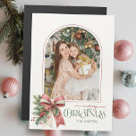 Elegant Coquette Bow Merry Christmas Arch Photo Magnetkarte<br><div class="desc">This charming holiday greeting features an elegant arch shaped photo template with thin pink border,  sweet watercolor blush pink and ecru coquette style bow with holly and winter greenery and custom Merry Christmas text graphic in coordinating pink and sage green colors.</div>