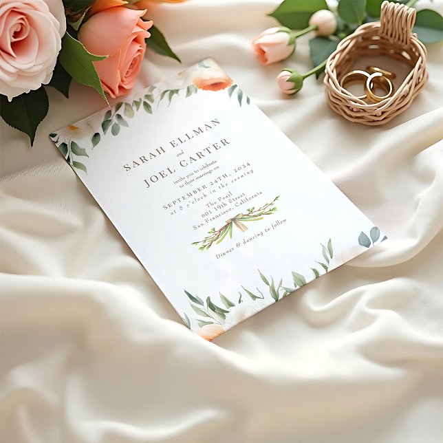 Élégant Faire-part de mariage botanique Ethérée (A peach toned wedding invitation mockup with floral details resting on a creamy fabric beside roses)