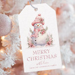 Elegant Floral Christmas Snowman Geschenkanhänger<br><div class="desc">Fügen Sie eine besondere Touch zu Ihrem Weihnachtsgeschenk in dieser Saison mit unseren eleganten, rosa und weiß blühenden Weihnachtsschneemannsmarken hinzu. Diese atemberaubenden Geschenketiker haben einen wunderschön gestalteten Aquarell-Schneemann, der in typografischem Schriftart "Frohe Weihnachten" geschrieben steht. Aber das ist noch nicht alles - diese Geschenketiketten sind vollständig anpassbar! Fügen Sie eine...</div>