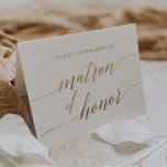 Elegant Gold Calligraphy Matron of Honour Dankeskarte<br><div class="desc">Diese elegante Goldkalligraphie Matron der Ehre danke Ihnen Karte ist perfekt für eine einfache Hochzeit. Das neutrale Design besticht durch eine minimalistische Karte, die mit romantischen und skurrilen Imitaten mit Goldfolien-Typografie dekoriert ist. Bitte beachten Sie: Dieses Design enthält keine echte Goldfolie. Es ist eine hochwertige Grafik, die wie Goldfolie aussieht....</div>