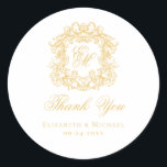 Elegant Gold Monogram Wedding Crest Thank You Runder Aufkleber<br><div class="desc">These elegant classic gold wedding monogram thank you stickers are perfect for favors, place cards, and more. They feature an ornate vintage crest with intertwined fancy script calligraphy monogram, and script Thank You. Find matching products in the collection, or message me through Zazzle Chat for more products and design tweaks....</div>