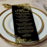 Elegant Golden Frilles on Black Wedding Menükarte<br><div class="desc">Dieses schöne Menü wird Ihrem Hochzeitsempfang etwas mehr Stil verleihen. Es zeichnet sich durch ein schönes Design mit verzierten goldenen Imitate-Foliengurten und Wirbel auf einem klassischen schwarzen Hintergrund aus. Es gibt Platz für die Namen des Paares und das Hochzeitstag, und der Text ist vollständig anpassbar. Elegant, elegant und glänzend, wird...</div>