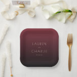 Elegant Maroon Minimalist Names Pappteller<br><div class="desc">This elegant wedding plate features a minimalist design with a gradient background transitioning from deep maroon to darker shades, creating a sophisticated and contemporary look. The clean, sans-serif typography is centered in the composition, offering customizable space for names and dates, perfect for personalizing your special day. The warm color palette...</div>