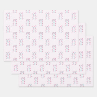 Élégant papier d'enrobage à ruban rose et bleu