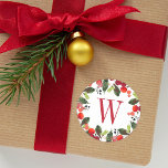 Elegant Red Christmas Greenery Monogram Wreath Runder Aufkleber<br><div class="desc">Das Holiday Aufkleber Design zeichnet sich durch ein wunderschönes Weihnachtsgrün-Aquarell-Design mit grünen Blätter und roten Beeren aus.</div>