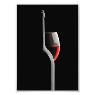 Elegant Red Wine Glass & Bottle. Black Background Fotodruck