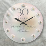 Elegant Script Pearl 30th Wedding Anniversary Große Wanduhr<br><div class="desc">Featuring beautiful pearls,  this chic 30th wedding anniversary clock can be personalized with your special pearl anniversary information on pearl background. Designed by Thisisnotme ©</div>