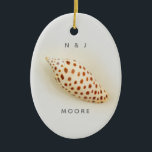Elegant Tropical Junonia Florida Beach Shell Name Keramik Ornament<br><div class="desc">Elegant Tropical Junonia Florida Beach Shell Name Ornament. This perfect Junonia beach shell is photographed with high resolution macro photography and is featured in the Junonia Beach Shell Collection. Personalize with your First Initials and Name. Junonia mollusks live in Coastal Ocean depths of over 100 feet, so Beach Combers rarely...</div>