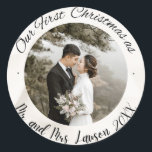 Elegant Unser First Christmas Foto Sticker<br><div class="desc">Eine moderne Typografie für diese Foto-Ziersammlung. So passen Sie sich an Ihr Lieblingsbild an. Sie können die Farbe des Schriftartes auch ganz nach Ihren Wünschen ändern.</div>