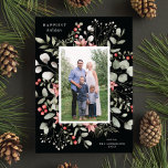 Elegant Winter Watercolor Greenery Black Photo Feiertagskarte<br><div class="desc">This elegant and festive holiday photo card features a beautiful watercolor wreath of holly, eucalyptus, and berries over a chic black background. The editable greeting on the front says "Happiest Holidays". The back of the card is a coordinating foliage pattern, which can be removed if desired. You can also add...</div>