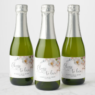 Elegante Brautparty mit Wildblumen Funkelnden Wein
