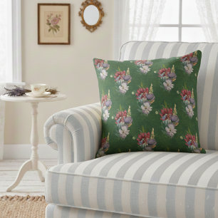 Elegante bunte Wildblumen auf dunklem Salbei Kissen