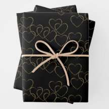 Elegante dekorative Herzklänge Gold und Schwarz