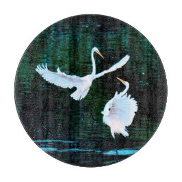 Elegante Egrets im Tanz Schneidebrett
