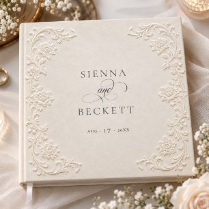 Elegante elfenbeinfarbene geprägte Blumen-Hochzeit Gästebuch
