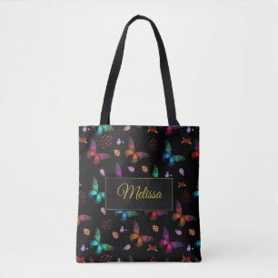 Elegante farbenfrohe Schmetterlinge auf der schwar Tasche