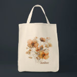Elegante farbige Wildblume Botanisches Monogramm Tragetasche<br><div class="desc">Tragen Sie eine Touch der Natur, wohin Sie auch gehen, mit dieser wunderschön gestalteten Aquarell-Wildblume-Tasche. Dieses künstlerisch-blumengeschmückte Bild verbindet rustikalen Charme und Eleganz mit einer delikaten Mischung aus warmen Orange- und erdbraunen Blüten, die durch üppiges Grün hervorgehoben werden. Diese langlebige Tasche, die sich ideal für Bauer-, Alltag- oder Öko-Shopping eignet,...</div>