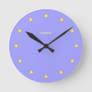 Elegante funkelnde Sterne auf Himmelblau Runde Wanduhr