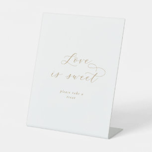 Elegante Gold Script Liebe ist süßes Hochzeitszeic Sockelschild