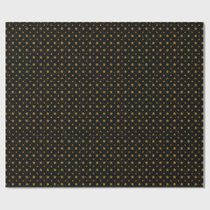 Elegante goldene Metallsterne auf schwarzem Gesche Geschenkpapier