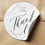 Elegante kalligraphische Hochzeit danke Ihnen für Runder Aufkleber<br><div class="desc">Elegante minimale Schwarz-Weiß-Gastgeschenk Hochzeit bedankt sich beim Aufkleber mit einem stilvollen,  schicken,  trendigen Kalligraphieskript.                       Einfach mit Ihren Daten personalisieren! Geeignet für feierliche Hochzeiten in schwarzer Krawatte.                 Bitte beachten Sie,  dass die Hintergrund- und Textfarben an Ihr Hochzeitsfarbschema angepasst werden können.</div>