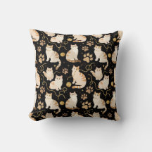 Elegante Katzen und glänzendes goldenes Garn auf S