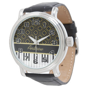 Elegante Klaviertasten mit goldener Quatrefolie au Armbanduhr