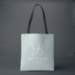 Elegante Personalisierte Bridesmaid in Schwarz und Tasche<br><div class="desc">Elegante Personalisierte Bridesmaid-Geschenke in Schwarz und Weiß mit personalisierten Monogrammen im eleganten Schriftart-Stil mit dem Namen und dem Titel der Brautjungfrau im klassischen Serif-Schriftart-Stil auf schlauem,  grünem Hintergrund. Auch perfekt für die Trauzeugin,  Blumenmädchen,  Brautmutter und vieles mehr.</div>