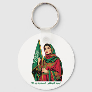 Elegante Saudi-Frau, die den T - Shirt der Flagge Schlüsselanhänger