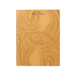 Elegante Schlaganfälle über orange Abstrakt Notizblock