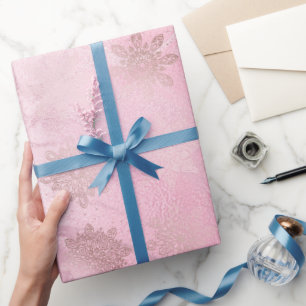 Elegante Schneeflocken aus Rosa-Gold Geschenkpapier