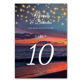Elegante Sunset Beach String Light Summer Wedding Tischnummer