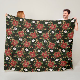 Elegante Weihnachtspoinsettie auf dunklem Hintergr Fleecedecke