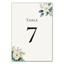 Elegante weiße Blumen- und Grünpflanzen-Hochzeitsf Tischnummer